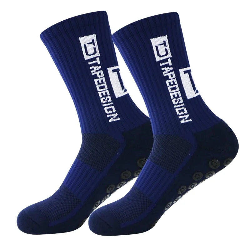 A pair of navy blue anti-slip performance sports socks with white text branding.