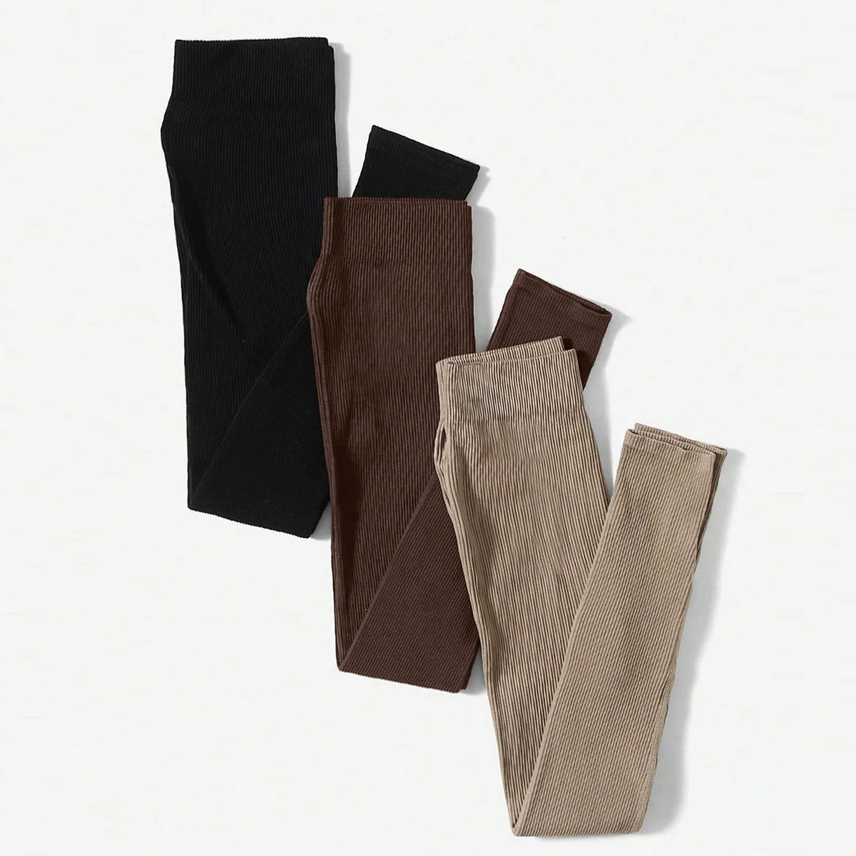 A pack of three seamless high-waisted yoga leggings in black, brown, and beige.
