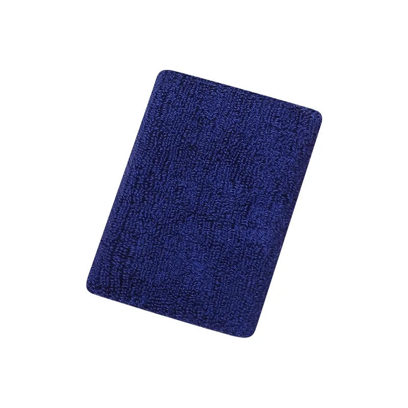 A dark blue knitted wristband for activewear.