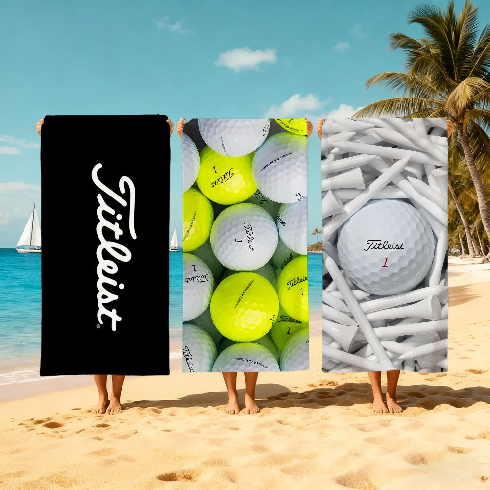 Three people holding large white golf balls against a tropical beach background.