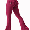 A model wearing magenta high stretch yoga leggings with a front pocket and a small detail on the thigh.
