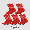 Five pairs of red Pro Grip Sox anti-slip soccer socks laid out on a light gray background.