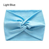 Light blue cross-knotted fabric headband for yoga and workout