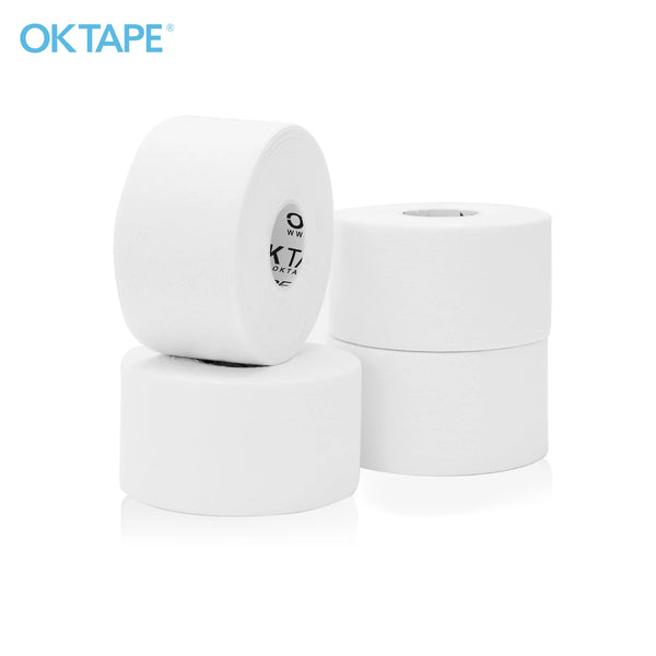 Rolls of white athletic sports tape for joint support and recovery