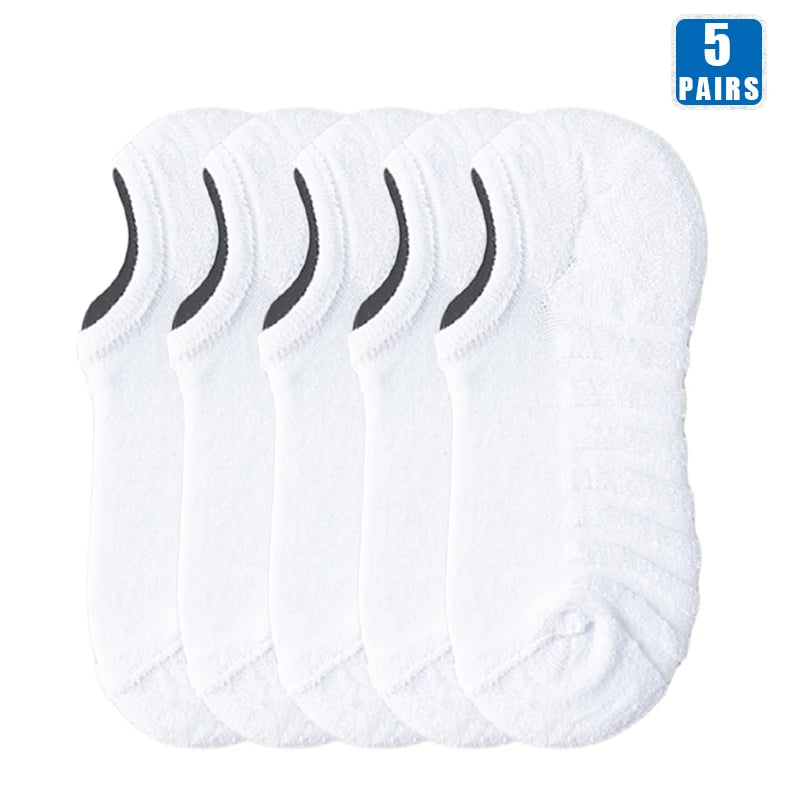 Five pairs of white men's cotton crew socks stacked together.