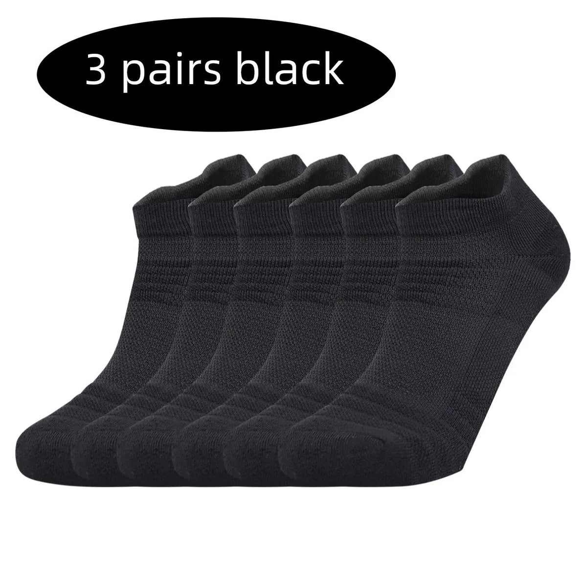Three pairs of black performance running socks laid out in a row.
