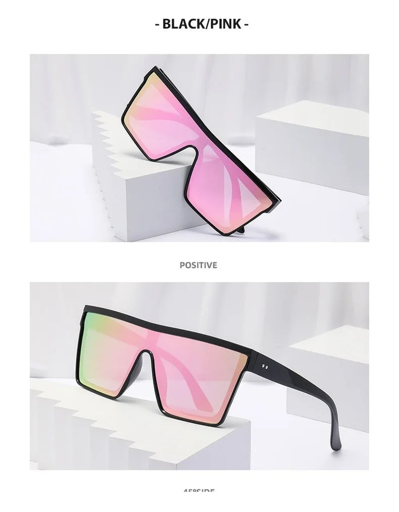 Black and pink retro square sunglasses displayed on a white pedestal.