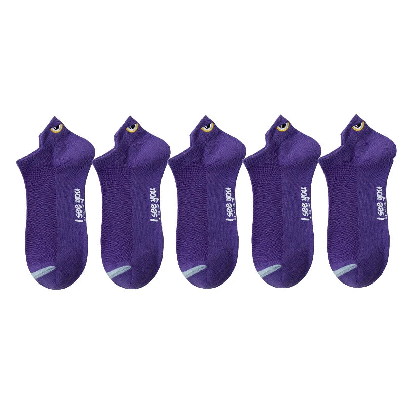 A set of purple men's breathable ankle boat socks with yellow accents.