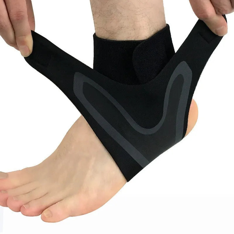 Black compression sleeve ankle support worn on a person's foot and ankle.