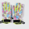 Une paire de gants de motocross roses et jaunes avec un motif.