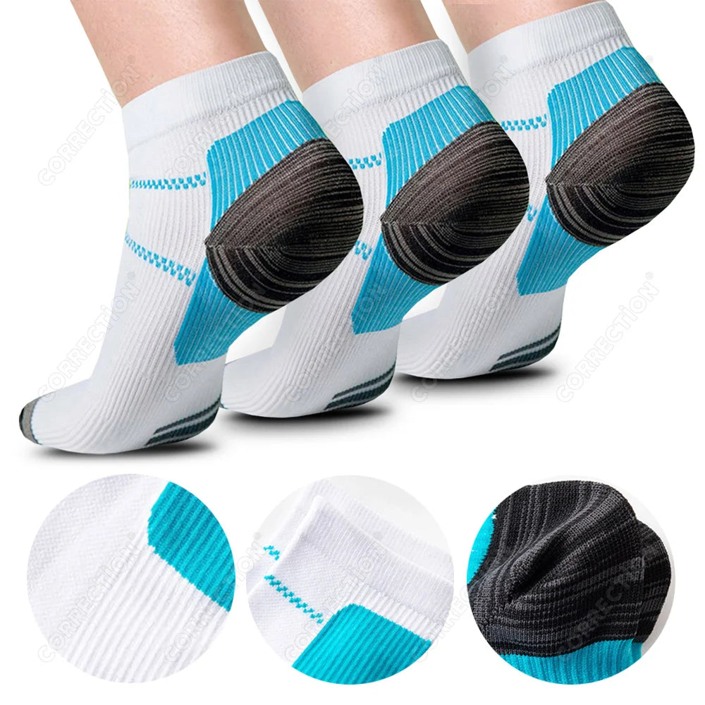 White compression socks with teal accents and black toe grips shown in various angles.