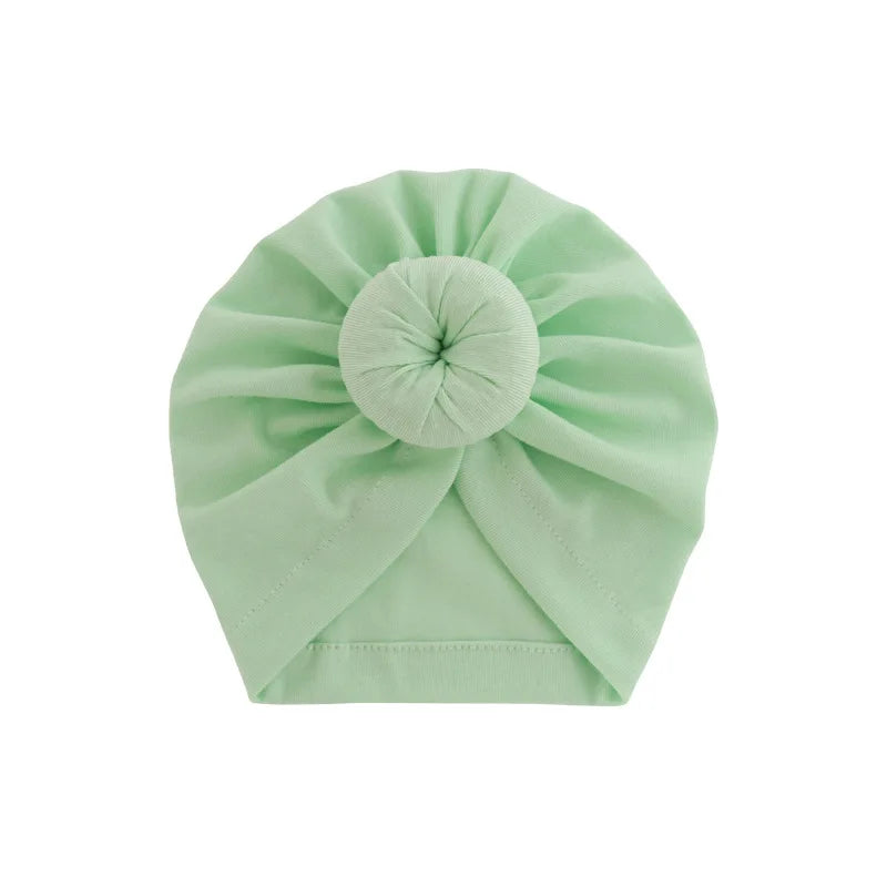 Festes miniges Cotton Baby-Turban, gefaltet in Schleifenform