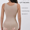 A model wearing a beige zippered shapewear bodysuit demonstrating the lift the hips feature.