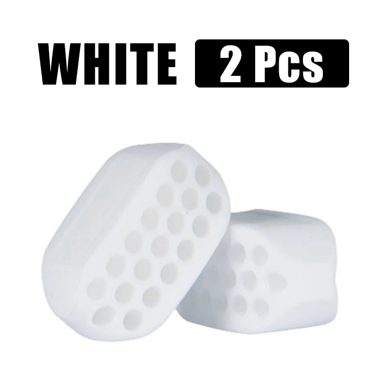 Two white silicone jawline exercisers for facial toning.