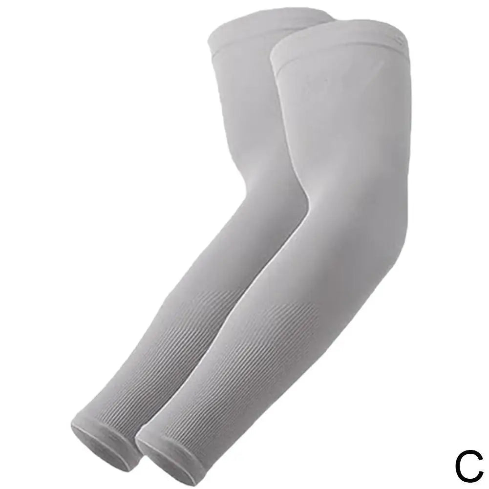 A pair of light gray UV protection arm sleeves for sports and outdoor activities.