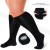 Black compression socks shown on a leg, highlighting the elastic material and toe design.