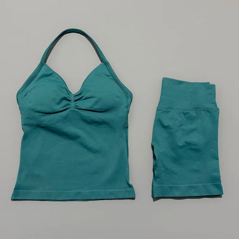 Teal women's seamless backless fitness set top and leggings
