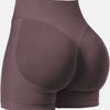 A close-up view of a mauve high-waisted knit fitness short for women.