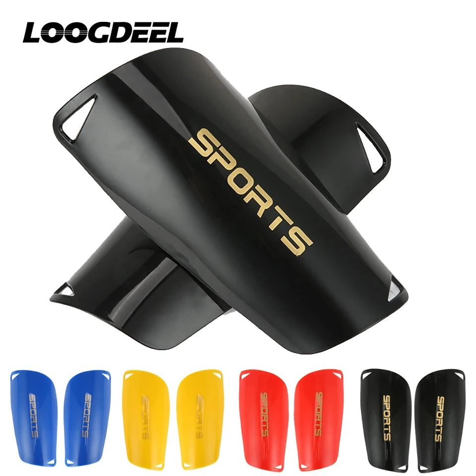 A set of black soccer shin guards for various ages and sizes shown from multiple angles.