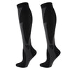 A pair of black compression socks designed for circulation and recovery.