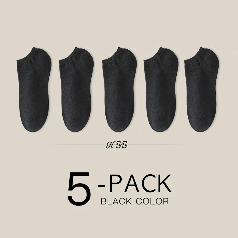 A pack of five black women's thin cotton no-show socks.
