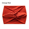 Bandeau en tissu bohème orange-rouge torsadé, plié en nœud