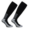 A pair of black professional training football socks with a grey cuff and patterned foot section.