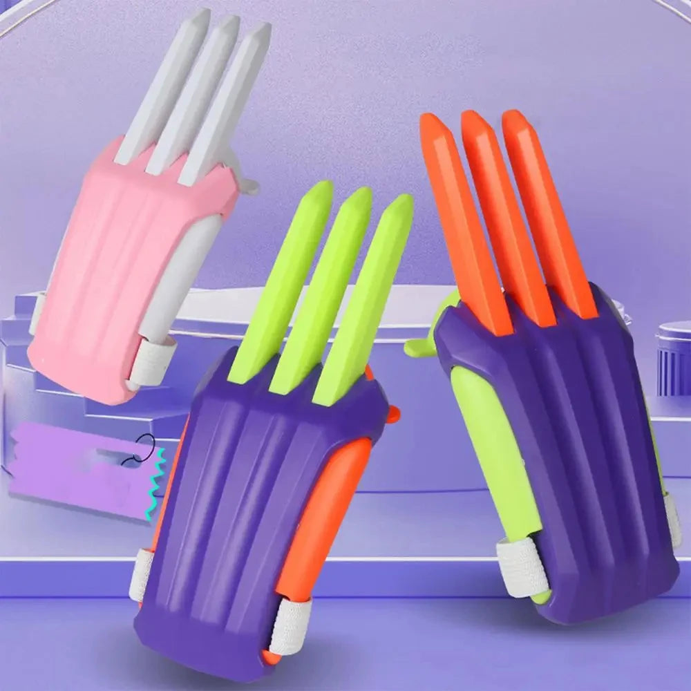 A set of colorful carrot-shaped fidget stress relief toys in pink, green, and purple.