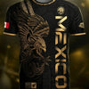 A black soccer jersey featuring a gold-toned eagle design and the word MEXICO printed on the front.