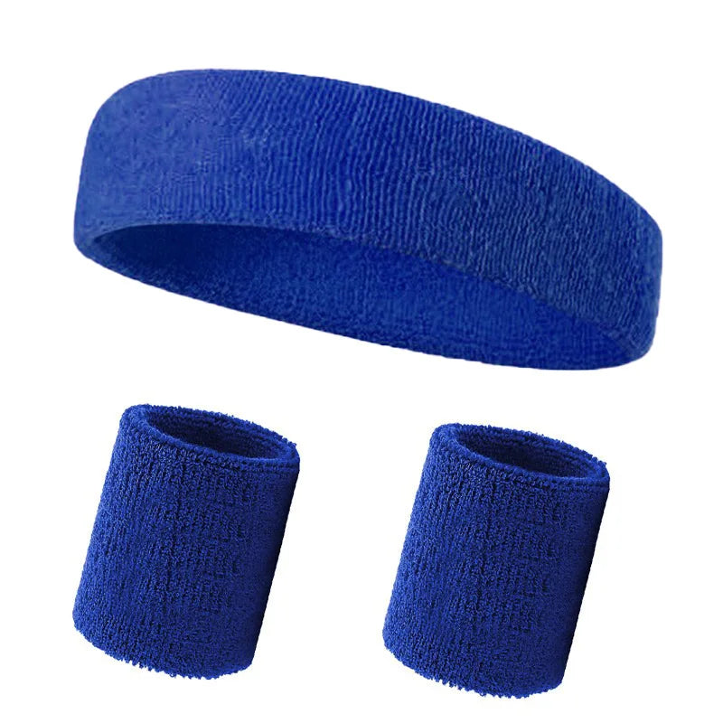 A set of three royal blue knitted sports headbands for fitness and activity
