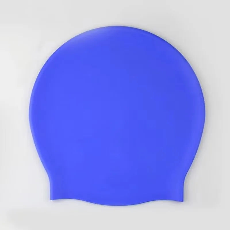 A smooth, bright blue silicone swim cap designed for long hair.