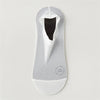 Chaussette en maille antidérapante blanche avec embout noir, présentée sur un fond clair.