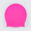 A bright pink extra large silicone swim cap designed for long hair.
