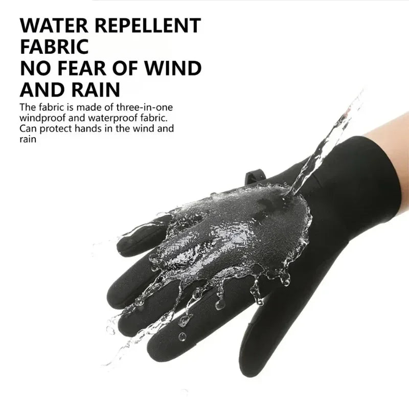 A hand wearing a black water repellent fabric glove is shown dripping wet.