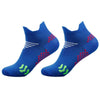 A pair of royal blue cycling and running socks with white and red patterned details.
