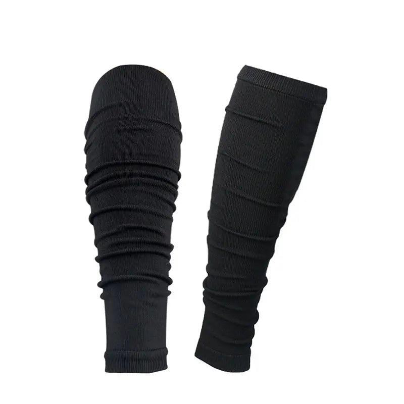 Black performance rugby leg covers for football training, shown vertically.