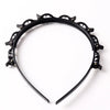 Set de clips y banda para el pelo con flequillo doble negro y detalles metálicos decorativos