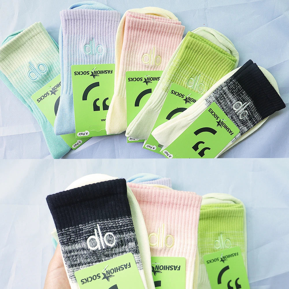 A collection of pastel colored and striped pure cotton winter socks for daily and sports wear