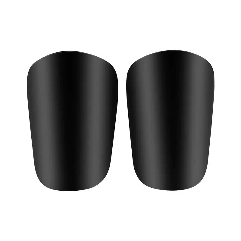 A pair of black mini soccer shin guards for training and protection.