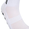 Close-up of white athletic soccer socks with a textured grip pattern on the foot area.