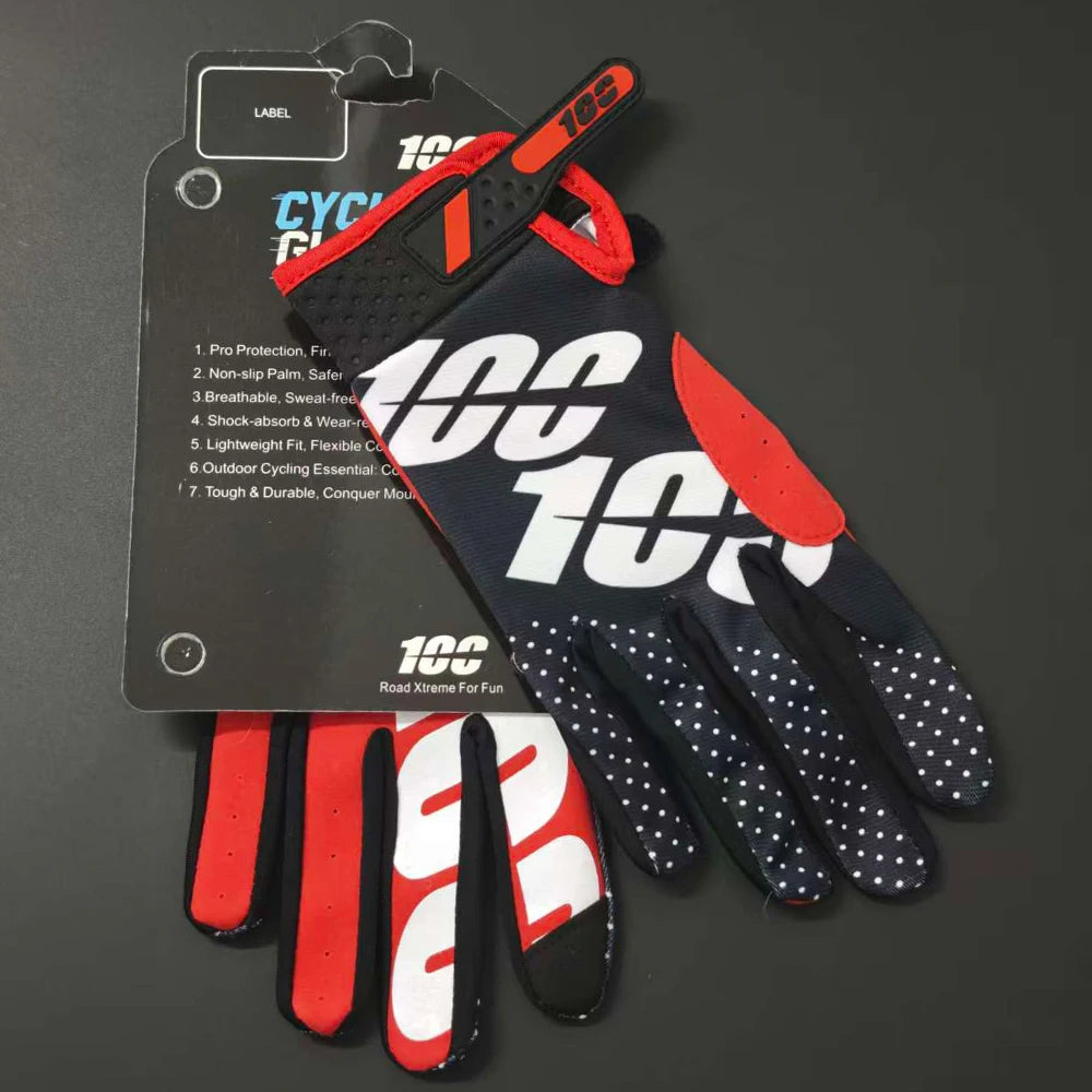 A set of black and red durable cycling gloves with a label showing features for off-road riding