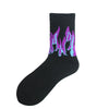 Black novelty socks with a purple flame pattern on the leg.