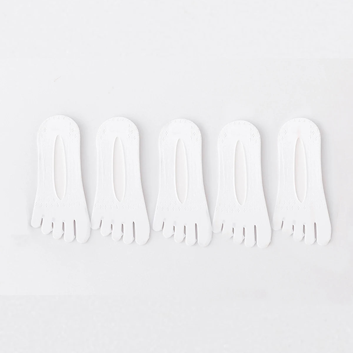 A pack of five ultra-thin invisible boat socks shown individually on a white background.