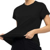 A woman wearing a black quick dry moisture-wicking gym t-shirt and black pants.