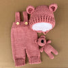 Handgewebtes rosa Bären-Fotoprodukt-Set mit gestricktem Körpers und Kopf.
