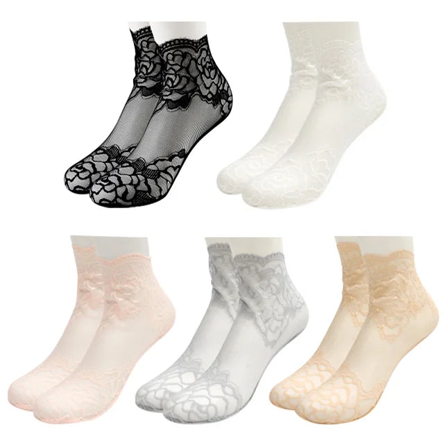 A set of lace mesh ankle socks in various shades of nude and white for summer