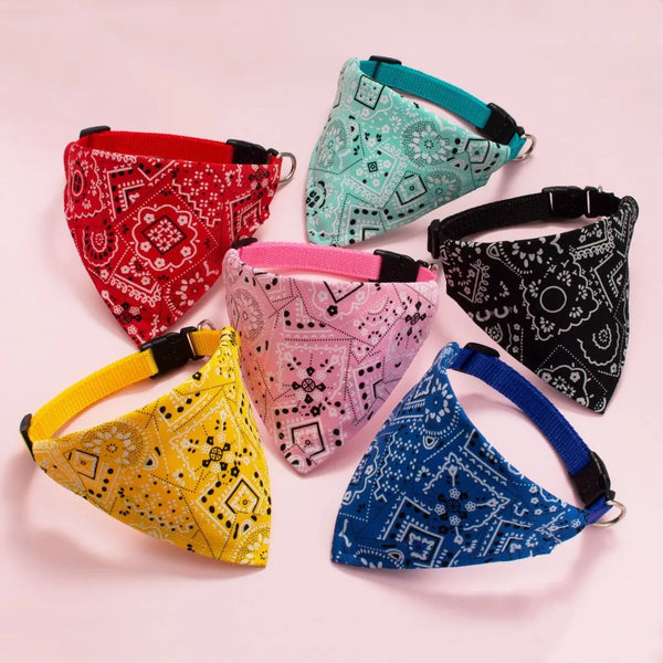 A collection of colorful, patterned adjustable pet scarves for dogs and kittens.