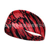 A red and black patterned elastic sports headband shown from the side.