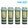 Four green sports shaker bottles with handles and stacked layers