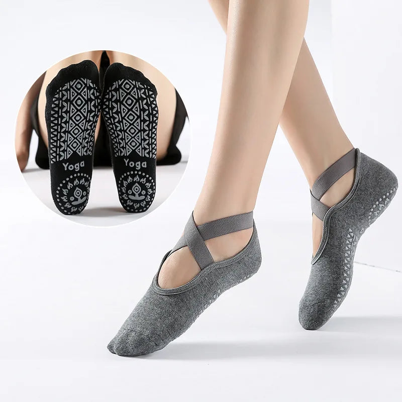 Gray silicone yoga socks shown on a foot and a close-up of patterned black yoga socks